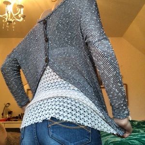 asymmetrical sweater style shirt